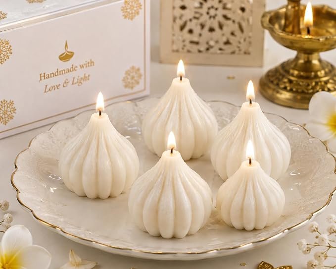 Vanilla scented modak candles by RENUCARTZ for festive decor